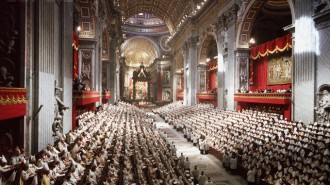 September 1962, Vatican City --- A meeting of Pope John XXIII's ecumenical council in St. Peter's Basilica, Vatican City.  This meeting of worldwide Catholic clergy was popularly known as the Second Vatican Council. --- Image by © David Lees/CORBIS