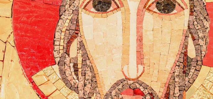 Detail of the face, eyes of jesus Christ in a mosaic