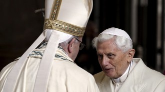 Pope Francis, left, meets Emeritus Pope Benedict XVI before open the Holy Door to mark opening of the Catholic Holy Year, or Jubilee, in St. Peter's Basilica, at the Vatican, on December 8, 2015. Photo courtesy of REUTERS/Max Rossi