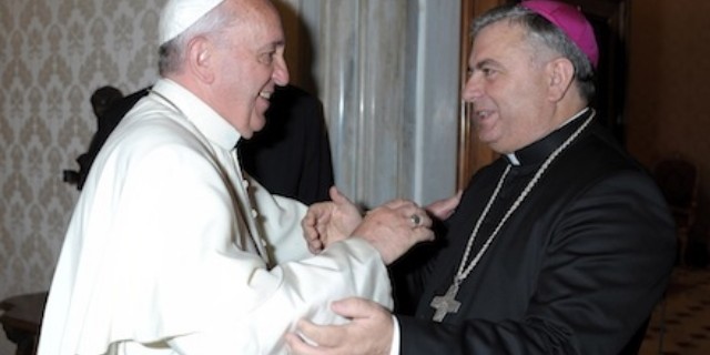 Pope Francis greets Archbishop Jose Rodriguez Carballo, secretary of the Vatican's Congregation for Institutes of Consecrated Life and Societies of Apostolic Life, during a private audience at the Vatican Oct. 5. (CNS photo/L'Osservatore Romano via Reuters) (Oct. 7, 2013)