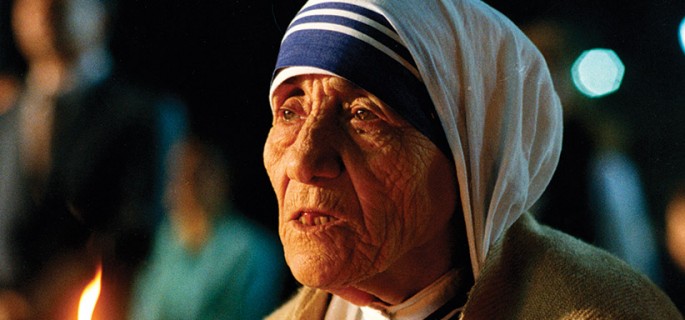 Pope Francis has approved a miracle attributed to the intercession of Blessed Teresa of Kolkata, paving the way for her canonization in 2016. Mother Teresa is pictured holding a candle in this undated photo. (CNS) See MOTHER-TERESA-SAINTHOOD-CAUSES Dec. 18, 2015.