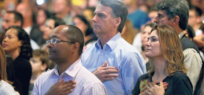 a47d0ff6-6834-11e9-8d56-44c415342777_Bolsonaro en un rito evangelico (Foto EFE)-RDCj4F7w81IiBR5ObHUeWMI-1024x576@LaStampa.it